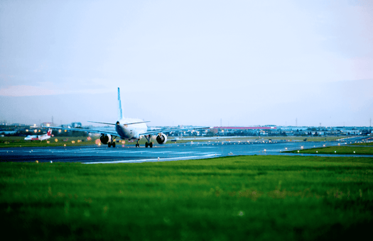 Plane taking off at airport runway